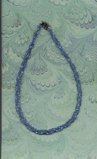 4-strands of deep blue sq. cut glass beads. Appx.20